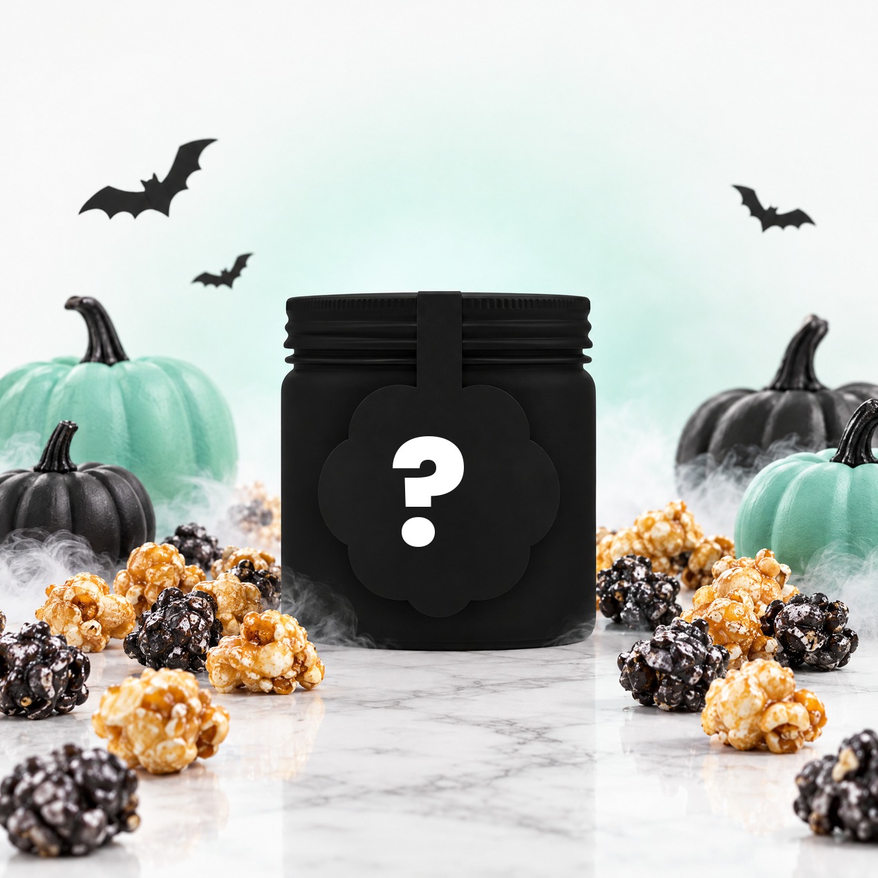 Tarro de palomitas gourmet Popit en silueta negra con palomitas caramelizadas, calabazas mint y negras y murciélagos: nuevo sabor de Halloween, próximamente